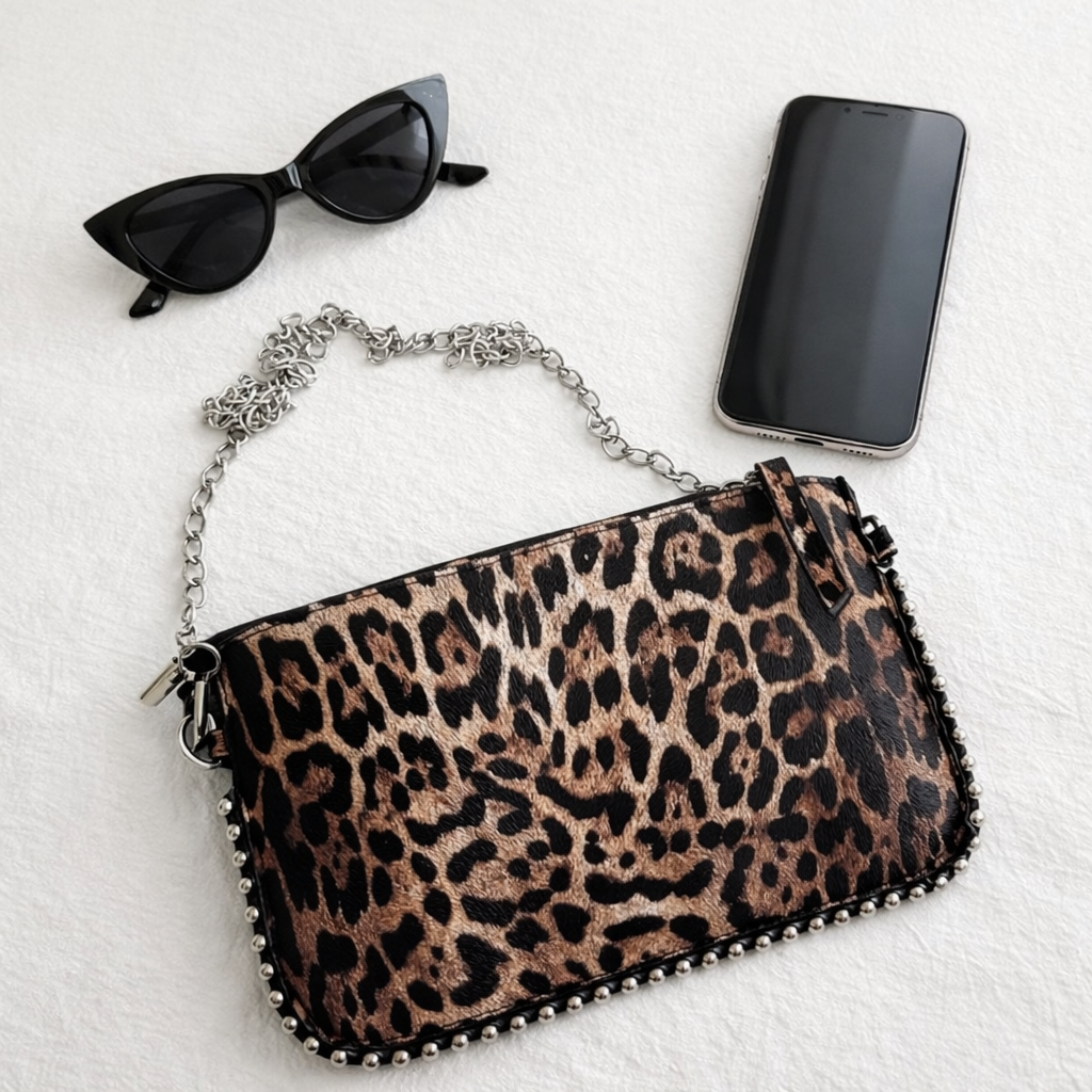 Borsa  Pochette tracolla Leopard con borchie